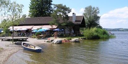 Campingplätze - Baden in natürlichen Gewässern - Restaurant "SeeAlm" am Camping Schwanenplatz - Camping Schwanenplatz