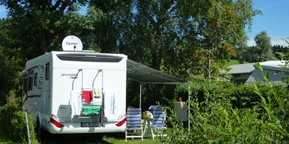 Campingplätze - Zentraler Stromanschluss - Unsere Wohnmobilstellplätze im Grünen.  - Camping Zeh am See/ Allgäu