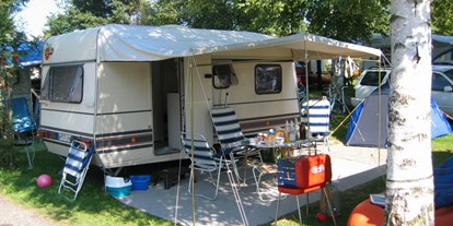 Campingplätze - Reisemobilstellplatz vor der Schranke - Insel Camping am See mit Ferienwohnung / Allgäu