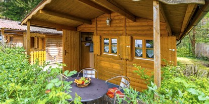 Campingplätze - Hunde Willkommen - Für etwas mehr Komfort bieten wir u.a. unsere Blockhütten an. - Camping Waldsee 